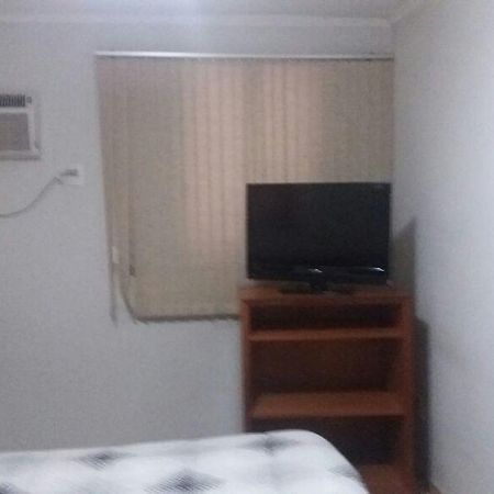 Abdon Flat Hotel Passos Esterno foto