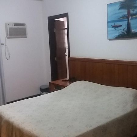 Abdon Flat Hotel Passos Esterno foto