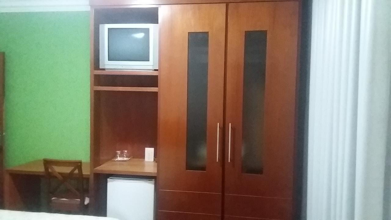 Abdon Flat Hotel Passos Esterno foto